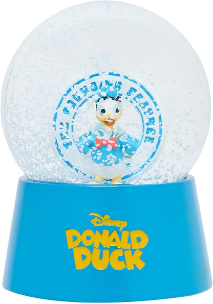 Snow globe with Donald Duck character on a blue base, featuring Disney branding.