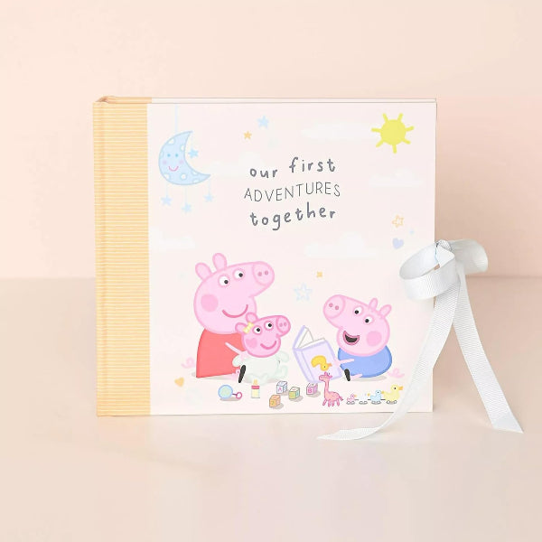 Children's book with Peppa Pig illustrations and text on a beige background