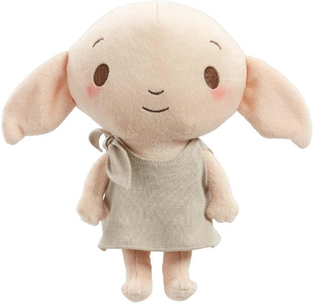 Plush toy with rabbit-like features wearing a beige dress on a white background