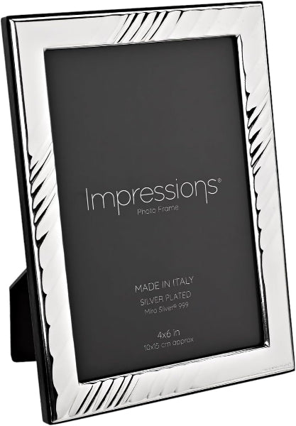 A silver-plated picture frame with a decorative diagonal striped border, shown standing upright on a black display insert. The insert reads 'Impressions Photo Frame' and 'Made in Italy Silver Plated Mini Silver 999 4x6 in 10x15 cm approx.