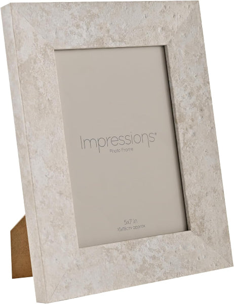 Beige stone-textured picture frame with 'Impressions' branding on a white background