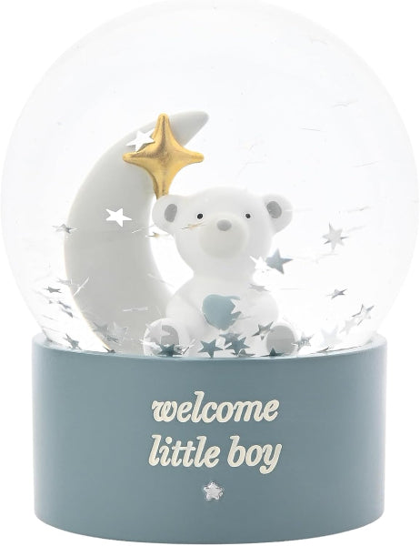 Decorative item with a teddy bear, moon, and star inside a glass dome with 'welcome little boy' text.