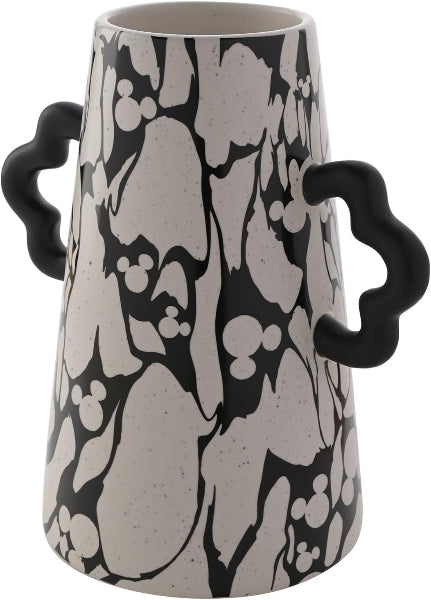 Vase with black and white floral pattern and black handles on a white background