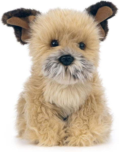 Plush toy resembling a dog with a tan coat and black ears on a white background
