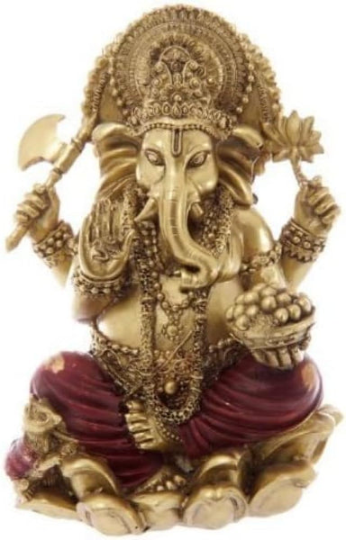 Gold-colored statue of a deity with a white background