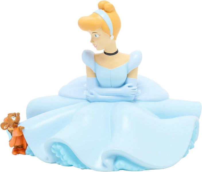 A Cinderella figurine wearing her signature light blue ball gown, seated with her arms crossed, and a small mouse companion at her left side, set against a plain white background.
