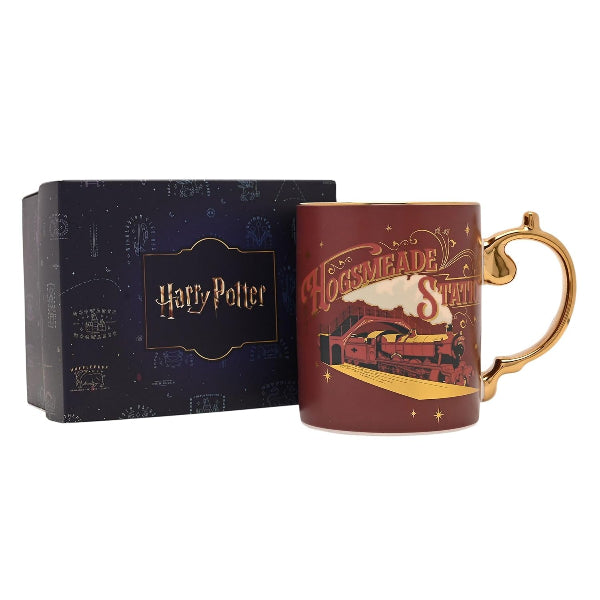 Harry Potter mug with gold handle and packaging on a white background
