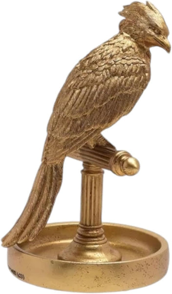 Gold bird-shaped object on a white background
