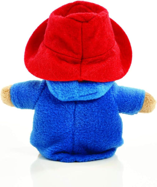 Blue plush toy with a red hat on a white background