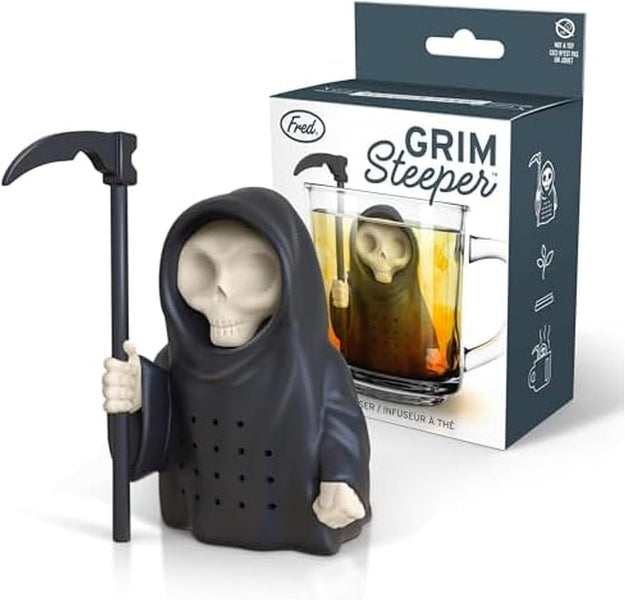 Grim Reaper-shaped tea infuser with packaging displaying the product and brand name.