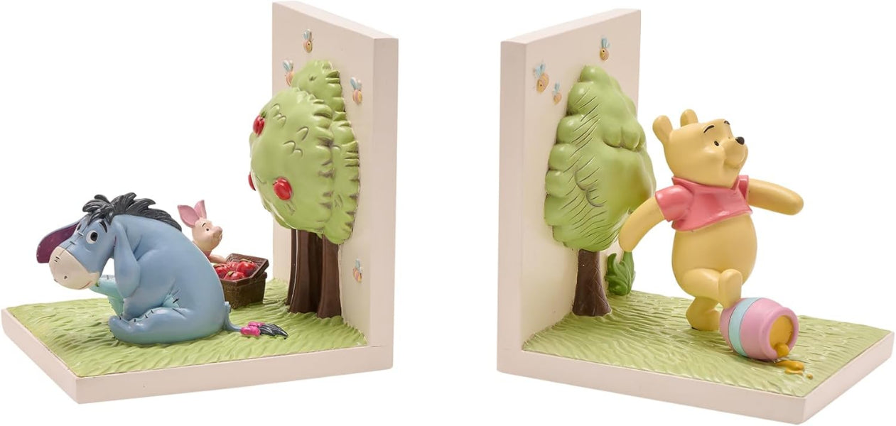 Winnie the Pooh and Eeyore bookends with a tree and basket on a white background