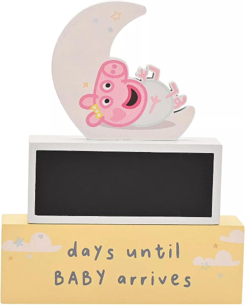 Decorative baby countdown item with cartoon character on a moon, on a white background