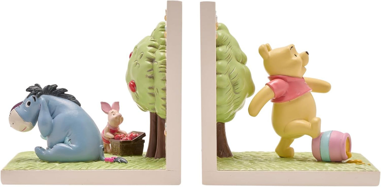 Winnie the Pooh and friends bookends with trees and a basket on a white background