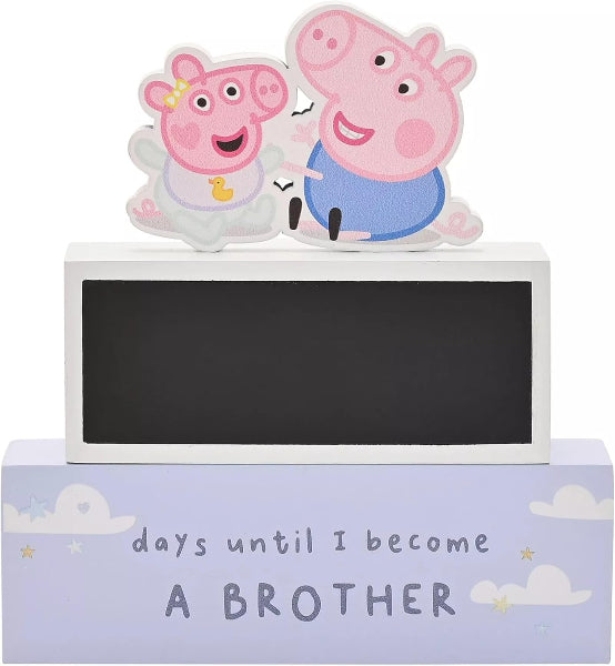 Decorative item with Peppa Pig and George Pig characters on a blackboard, counting days until becoming a brother.