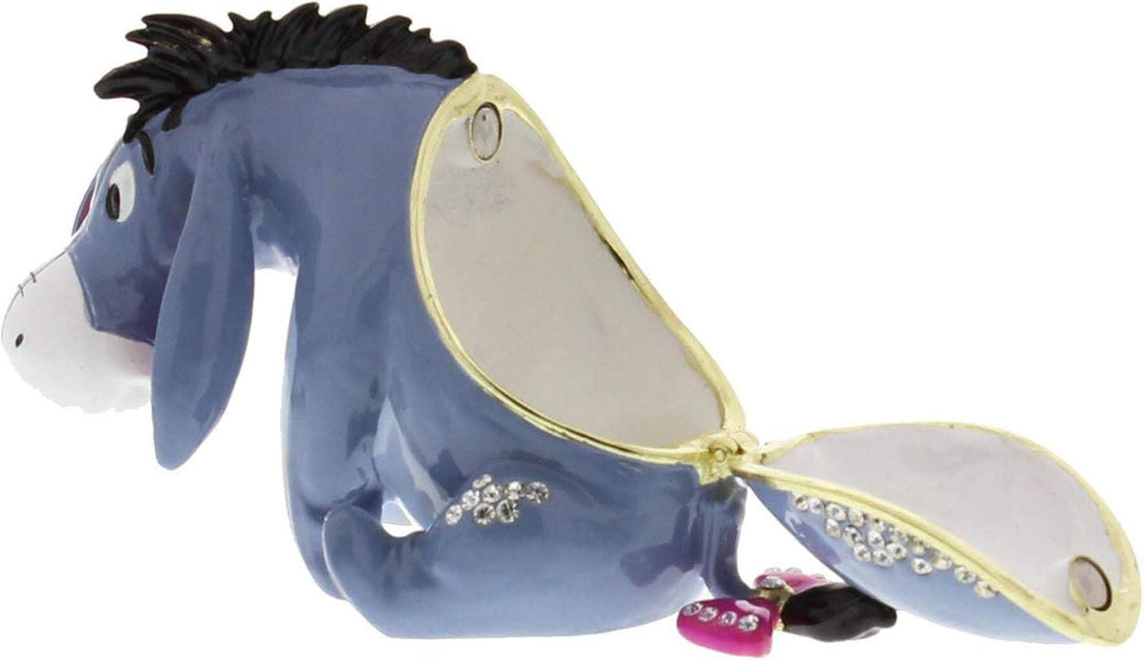 Blue donkey-shaped pouch with decorative elements on a white background