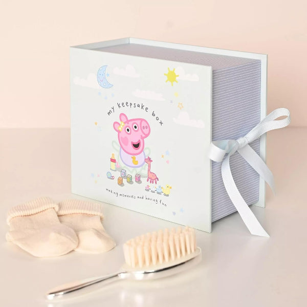 Keepsake box with cartoon character and baby items on a light background