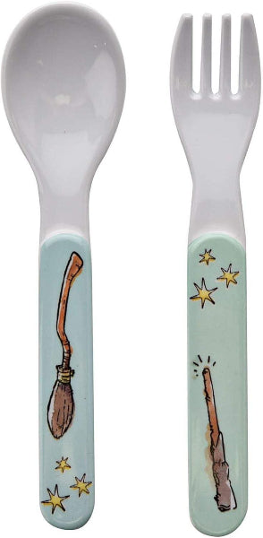 Children's spoon and fork set with broomstick and star designs on a light blue background