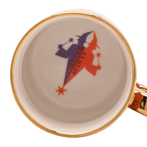 Mug with a rocket ship design and 'Wesley' text on a white background