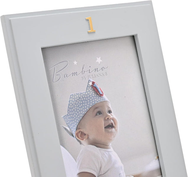 A light gray wooden picture frame with a small gold number 1 at the top and a sample photo of a baby wearing a polka-dot hat. The frame is shown at an angle on a white background.