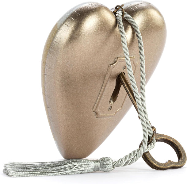 A metallic gold heart-shaped decorative object with a hanging rope and tassel, shown on a plain white background.