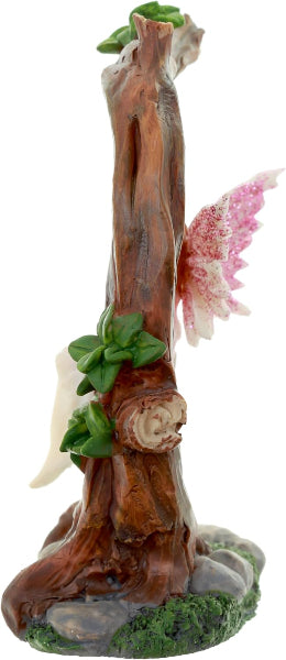 Decorative figurine of a fairy on a branch with pink wings and green leaves.