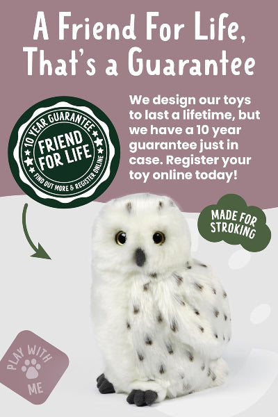 White stuffed owl toy with promotional text about a 10-year guarantee on toys.