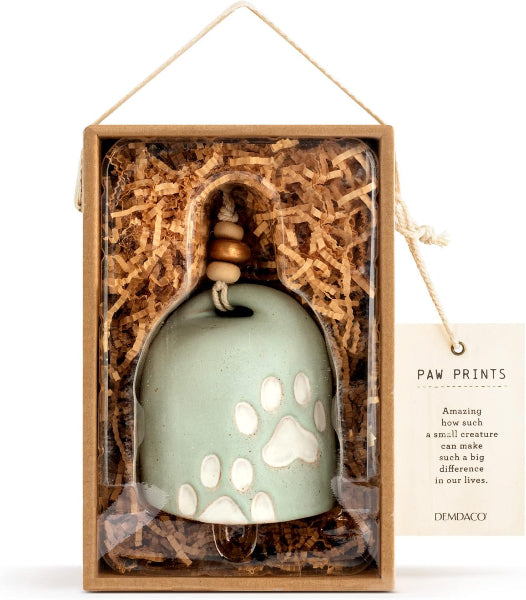 Decorative bell with paw prints in a wooden box packaging.