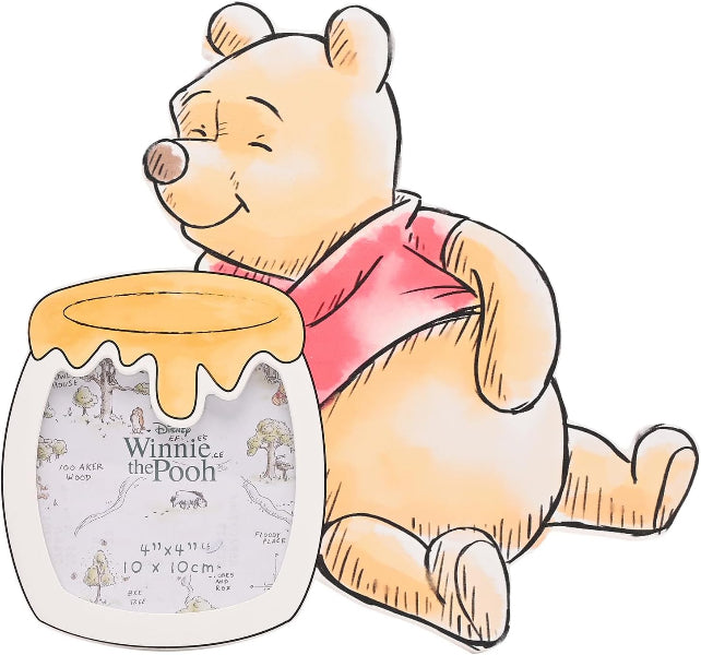 Winnie the Pooh holding a jar of honey with a white background