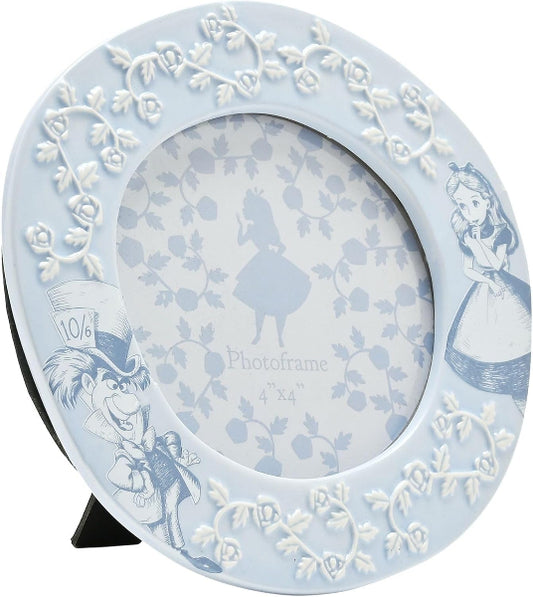 Decorative photo frame with Alice in Wonderland design on a white background
