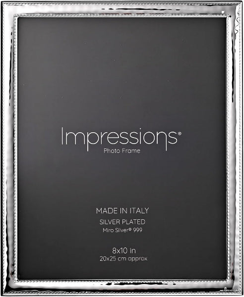 A silver-plated Impressions photo frame with a textured, hammered-style border, shown empty and centered against a dark gray background.