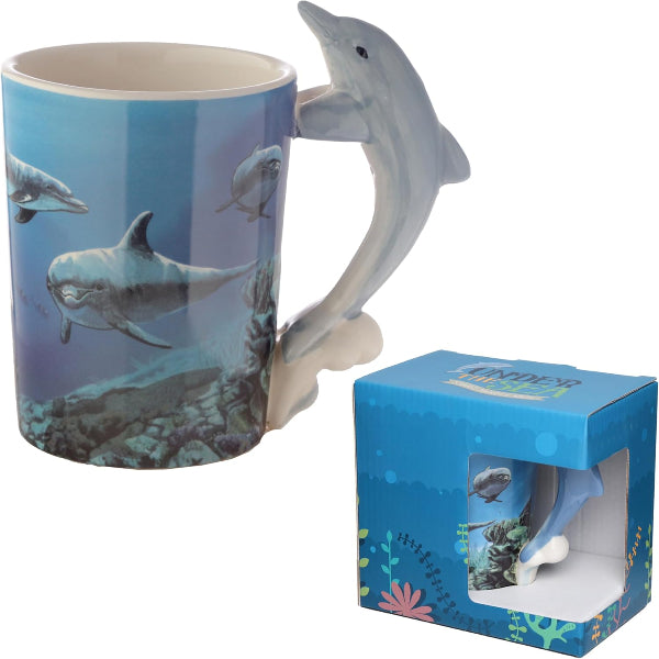 Dolphin-shaped mug with underwater design and packaging on a white background