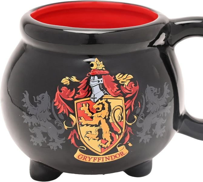 Black mug with Gryffindor crest and red interior on a white background