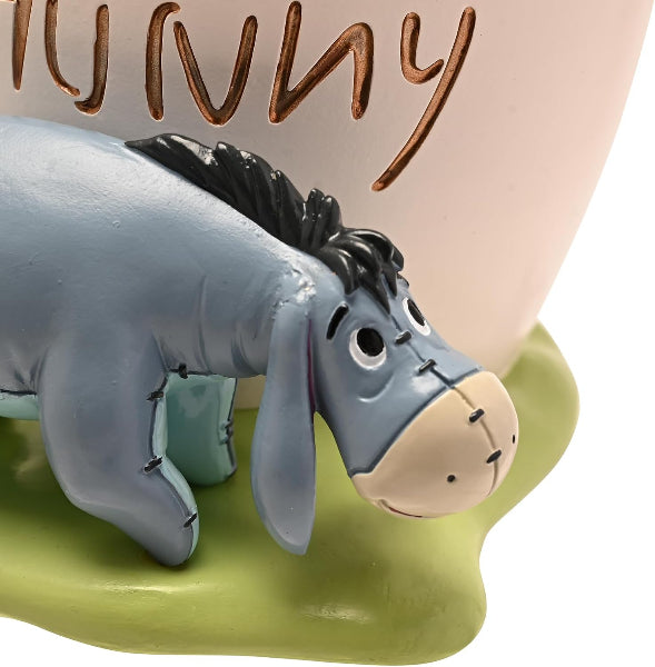 Donkey figurine with 'Hunny' text on a pink background