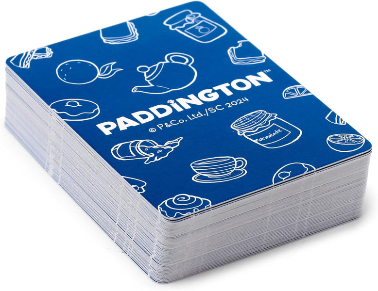 Stack of blue cards with white illustrations and 'Paddington' branding on a white background