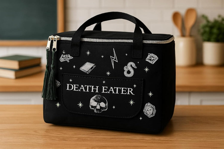 Black bag with 'DEATH EATER' text and decorative elements on a wooden surface.