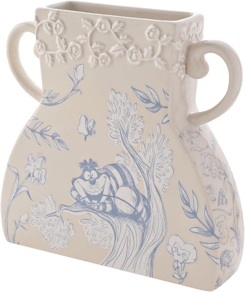 Decorative vase with blue animal design and floral patterns on a beige background