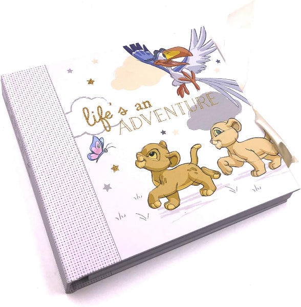 Notebook with cartoon characters and 'Life's an Adventure' text on a white background