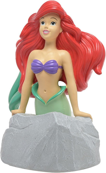 Mermaid figurine with red hair and a purple top on a white background