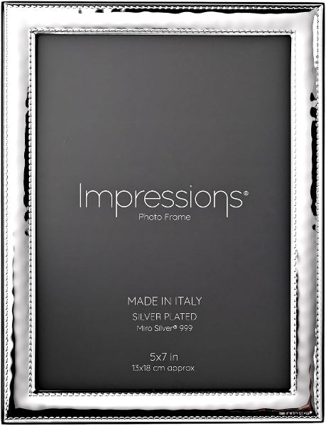 Silver photo frame with 'Impressions' branding on a black background