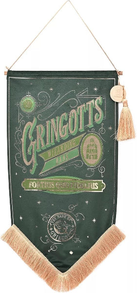 Decorative banner with 'Gringotts' text and design on a green background