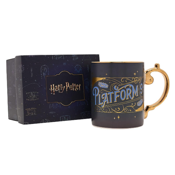 Harry Potter mug with gold handle and 'Platform 9' text, next to a matching box.