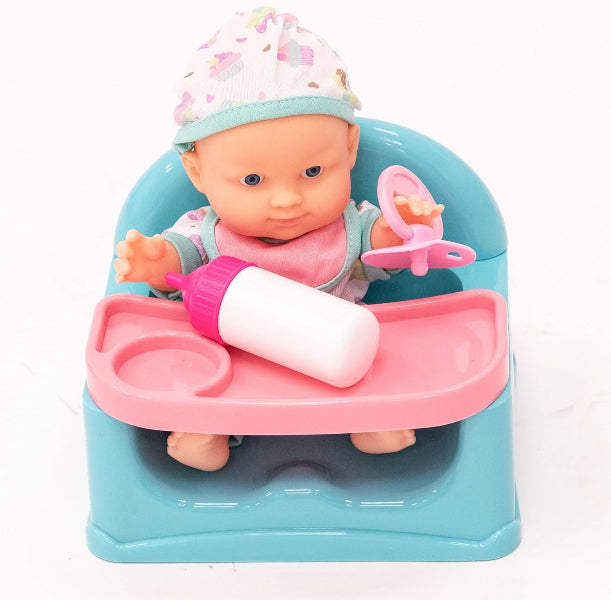 Toy baby in a high chair with a bottle and pacifier on a white background