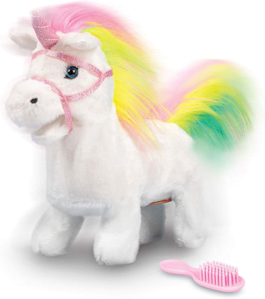 White plush unicorn with a rainbow mane and pink bridle on a white background