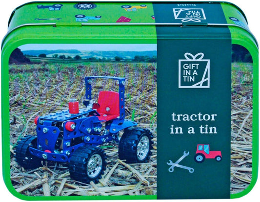 Toy tractor in a tin with a green lid featuring an image of a tractor and text.