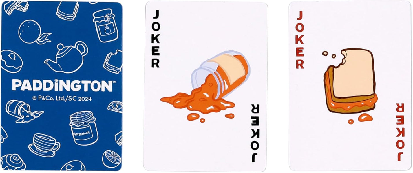 Three playing cards featuring Paddington Bear branding and illustrations.