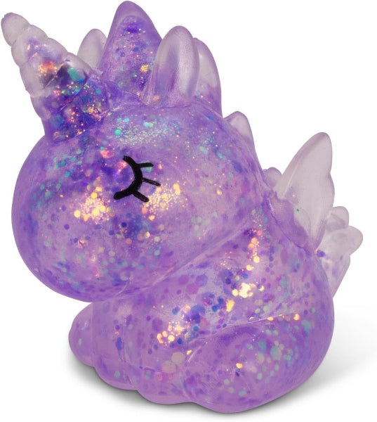 Glittery purple unicorn figurine on a white background