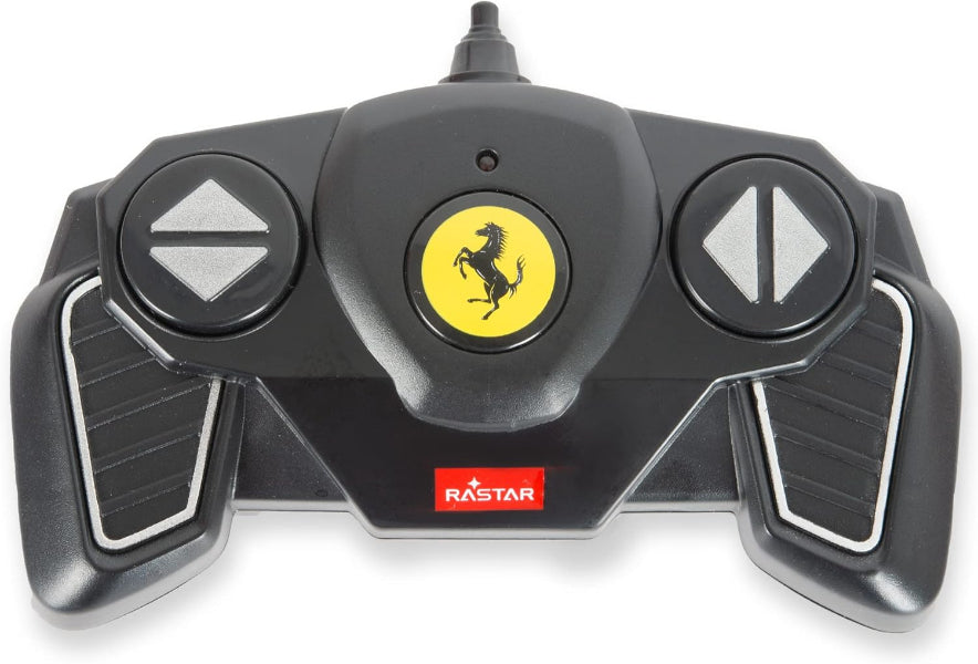 Toy remote control with Ferrari logo on a white background