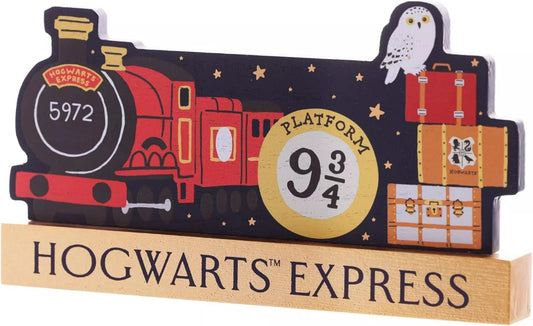 Decorative sign of Hogwarts Express with Platform 9 3/4 emblem and owl on a black background.