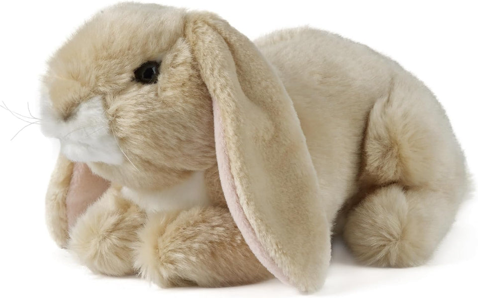 A fluffy lop-eared bunny plush toy in light beige with white accents on its muzzle and chest, pink inner ears, and a black eye, photographed on a clean white background.