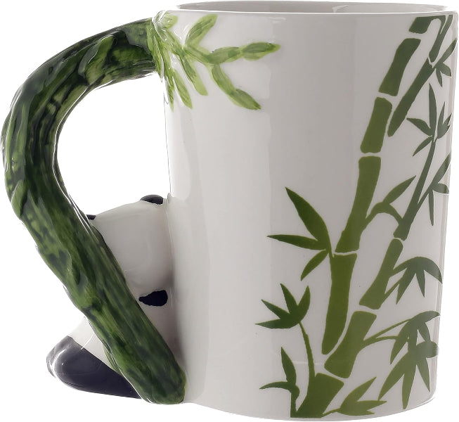 White mug with green bamboo design and handle on a white background.